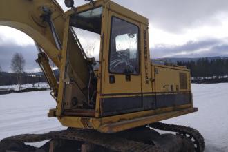 Cat 219 gravemaskin