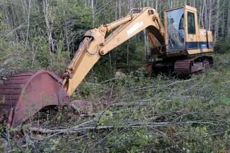 Cat 215 gravemaskin